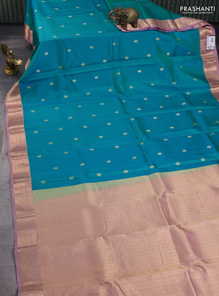 Pure kanchipuram silk saree teal blue and pastel pink with zari woven buttas and zari woven korvai border