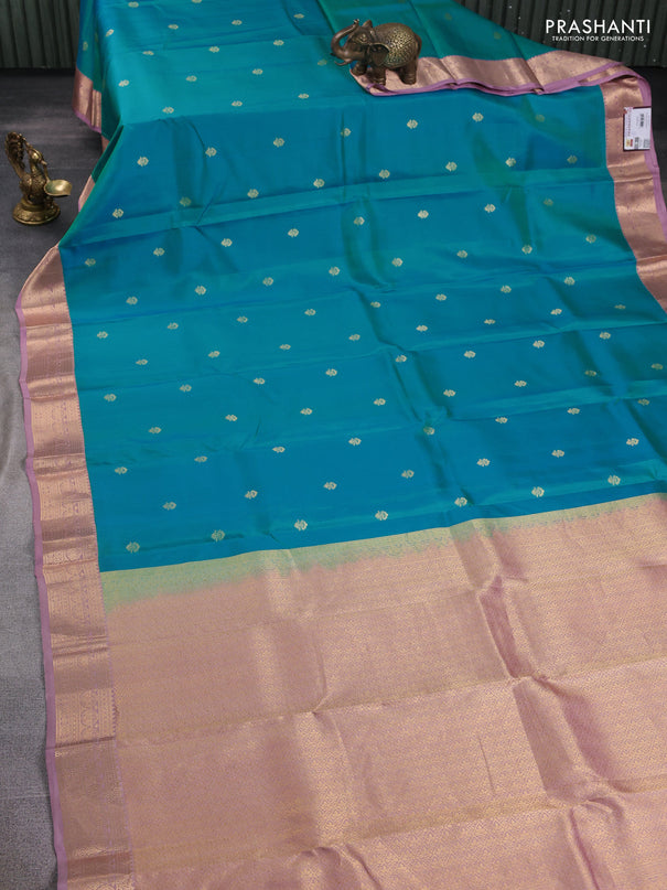 Pure kanchipuram silk saree teal blue and pastel pink with zari woven buttas and zari woven korvai border