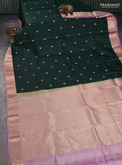 Pure kanchipuram silk saree bottle green and pastel pink with zari woven buttas and zari woven korvai border