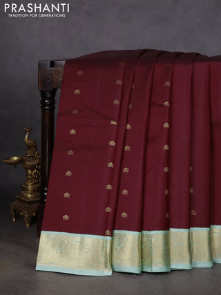 Pure kanchipuram silk saree deep maroon and pastel green with zari woven buttas and zari woven korvai border