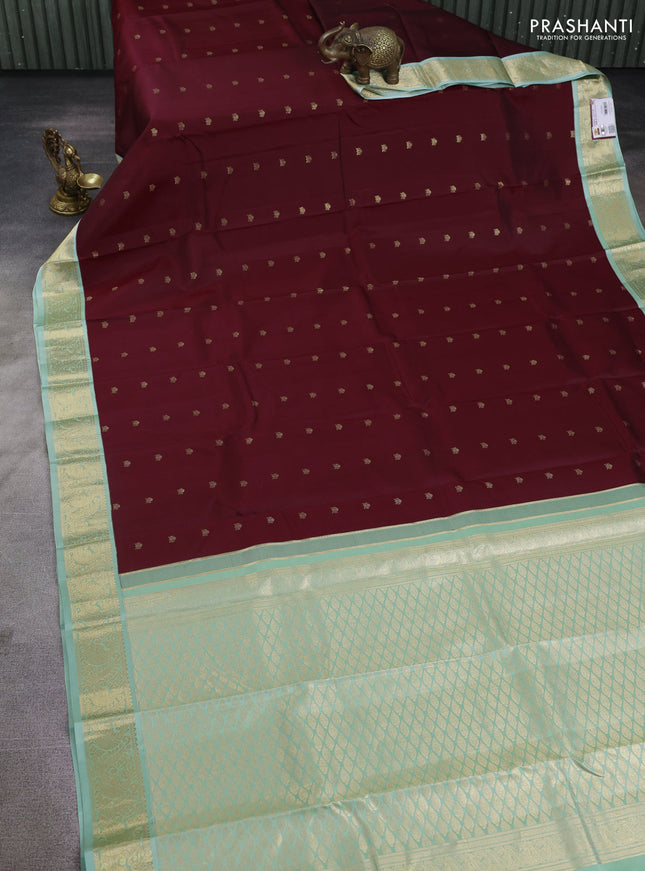 Pure kanchipuram silk saree deep maroon and pastel green with zari woven buttas and zari woven korvai border