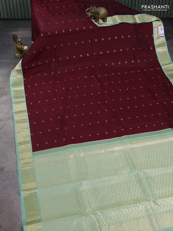 Pure kanchipuram silk saree deep maroon and pastel green with zari woven buttas and zari woven korvai border
