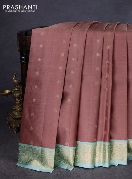 Pure kanchipuram silk saree brown and pastel green with zari woven buttas and zari woven korvai border