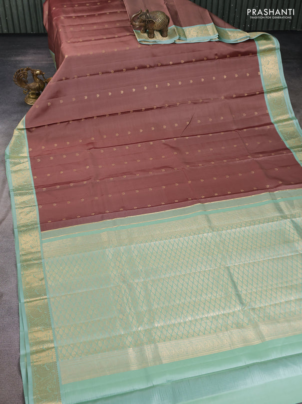 Pure kanchipuram silk saree brown and pastel green with zari woven buttas and zari woven korvai border