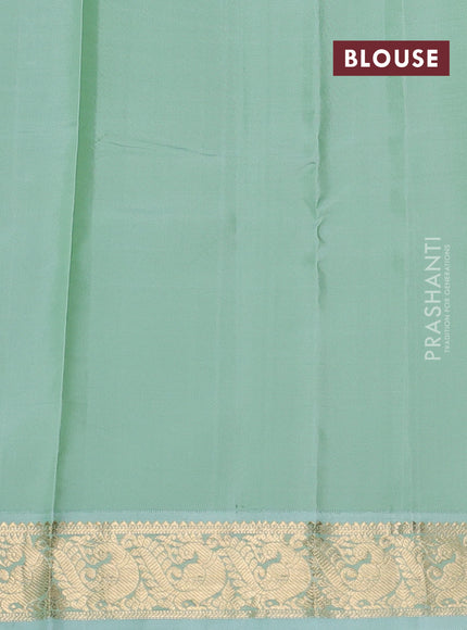 Pure kanchipuram silk saree brown and pastel green with zari woven buttas and zari woven korvai border