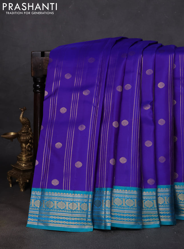 Pure kanchipuram silk saree royal blue and teal green with allover zari stripes & buttas and zari woven korvai border