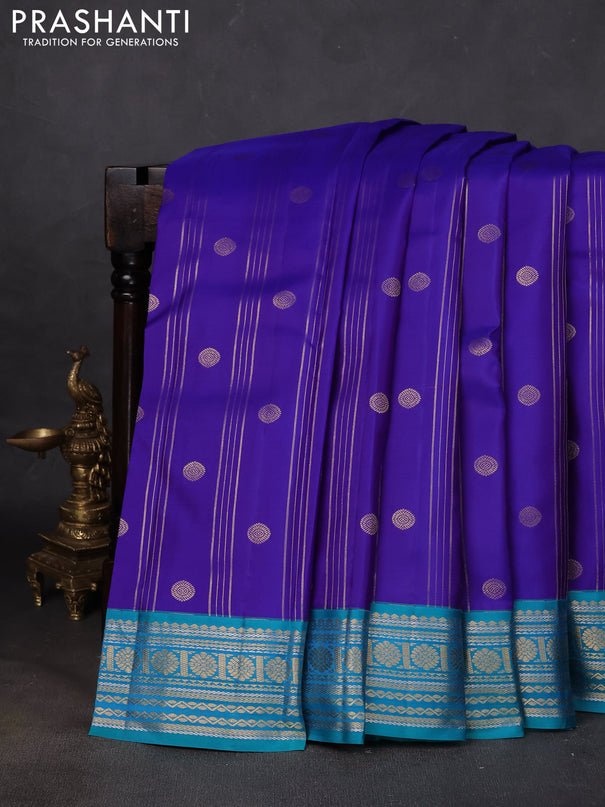 Pure kanchipuram silk saree royal blue and teal green with allover zari stripes & buttas and zari woven korvai border