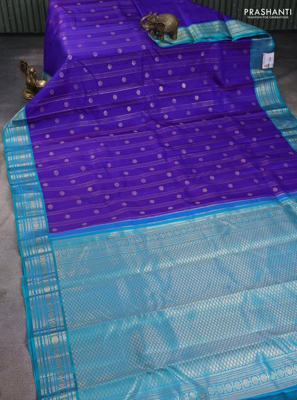 Pure kanchipuram silk saree royal blue and teal green with allover zari stripes & buttas and zari woven korvai border