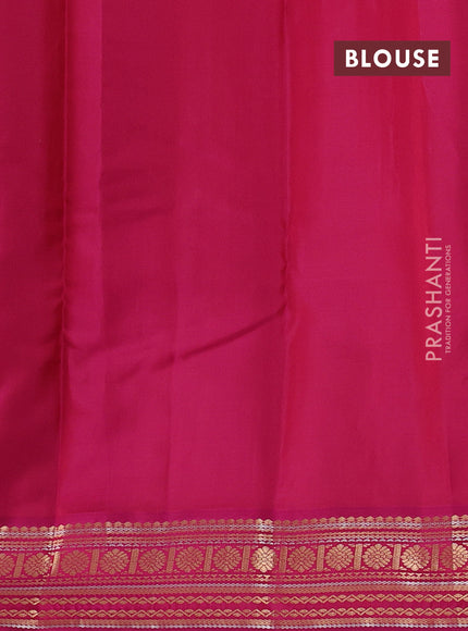 Pure kanchipuram silk saree dual shade of teal green and pink with allover zari stripes & buttas and zari woven korvai border