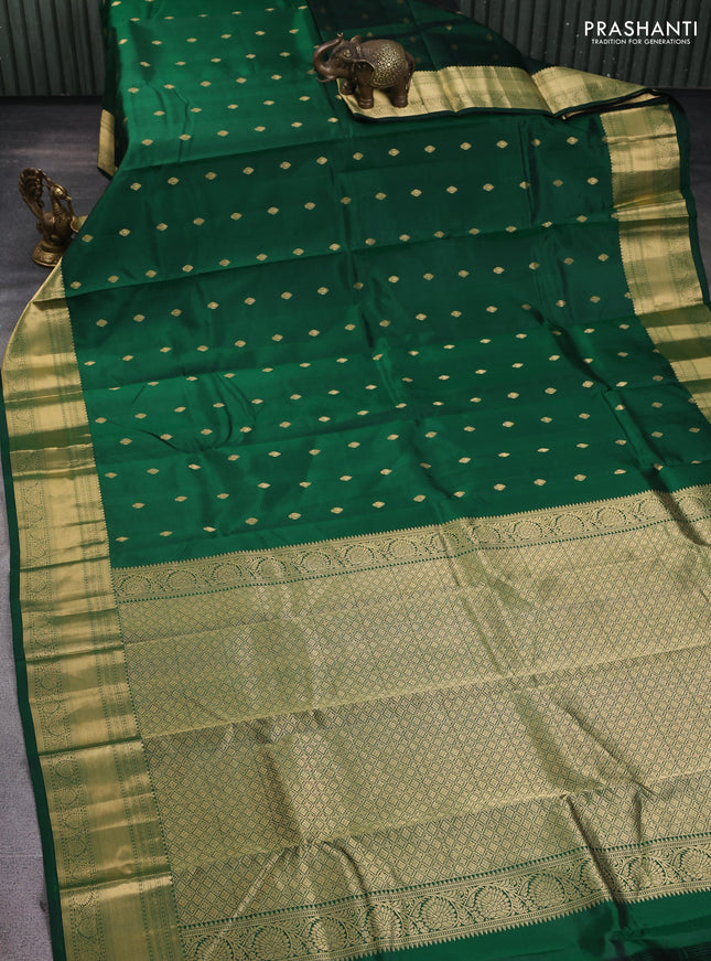 Pure kanchipuram silk saree bottle green with zari woven buttas and zari woven korvai border