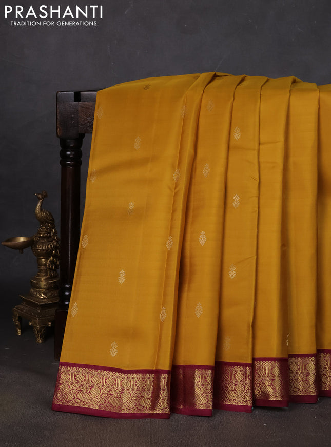Pure kanchipuram silk saree yellow and wine shade with zari woven buttas and zari woven korvai border