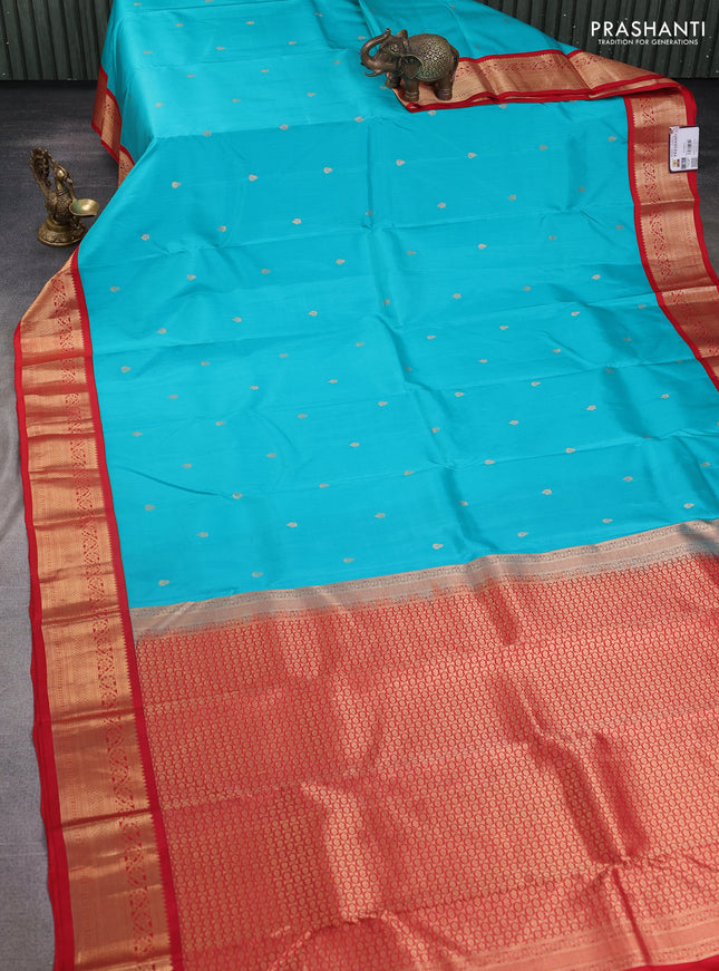Pure kanchipuram silk saree teal blue and red with zari woven buttas and zari woven korvai border