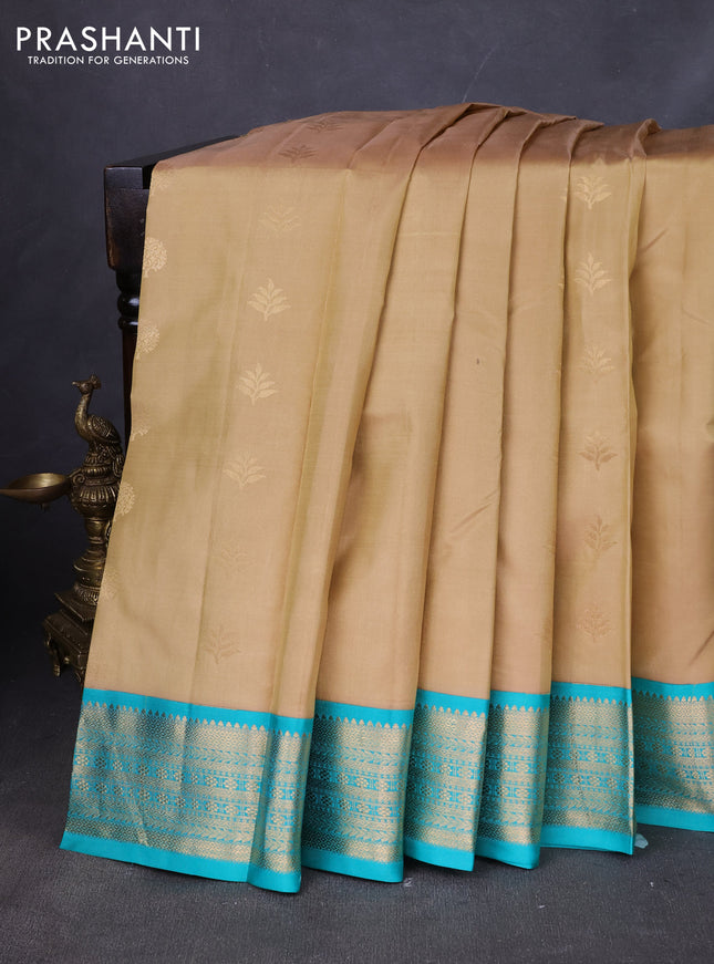 Pure kanchipuram silk saree sandal and teal green with zari woven buttas and zari woven korvai border