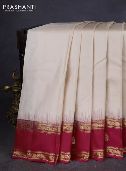 Pure kanchipuram silk saree cream and pink with zari woven buttas and rettapet zari woven butta border