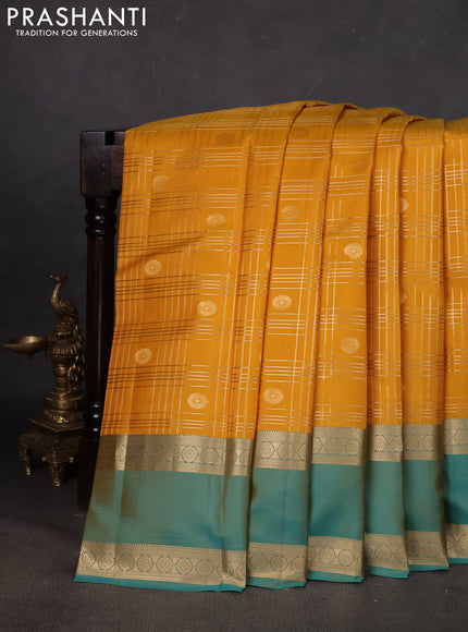 Pure kanchipuram silk saree yellow and teal green with allover zari checks& buttas and rettapet zari woven border