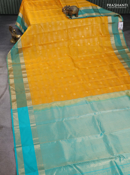 Pure kanchipuram silk saree yellow and teal green with allover zari checks& buttas and rettapet zari woven border