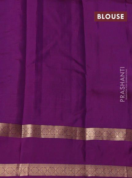 Pure kanchipuram silk saree pastel green and purple with allover zari checks& buttas and rettapet zari woven border