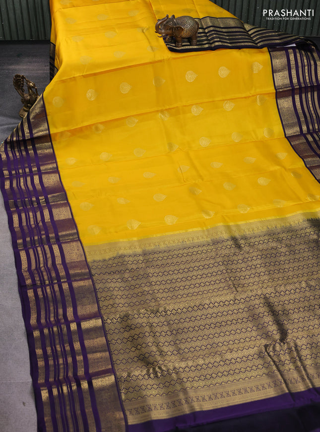 Pure kanchipuram silk saree yellow and violet with zari woven buttas and long zari woven border