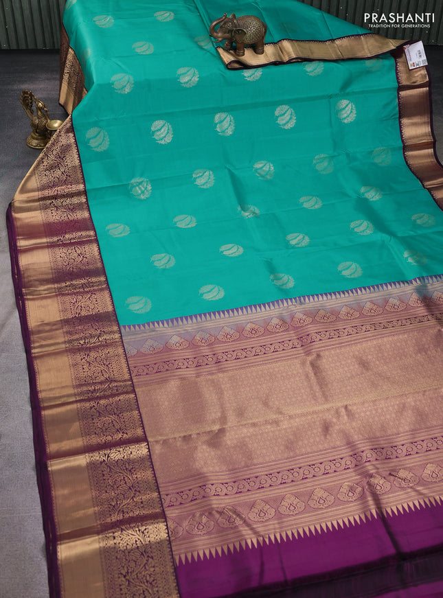 Pure kanchipuram silk saree teal green and wine shade with zari woven buttas and long zari woven korvai border