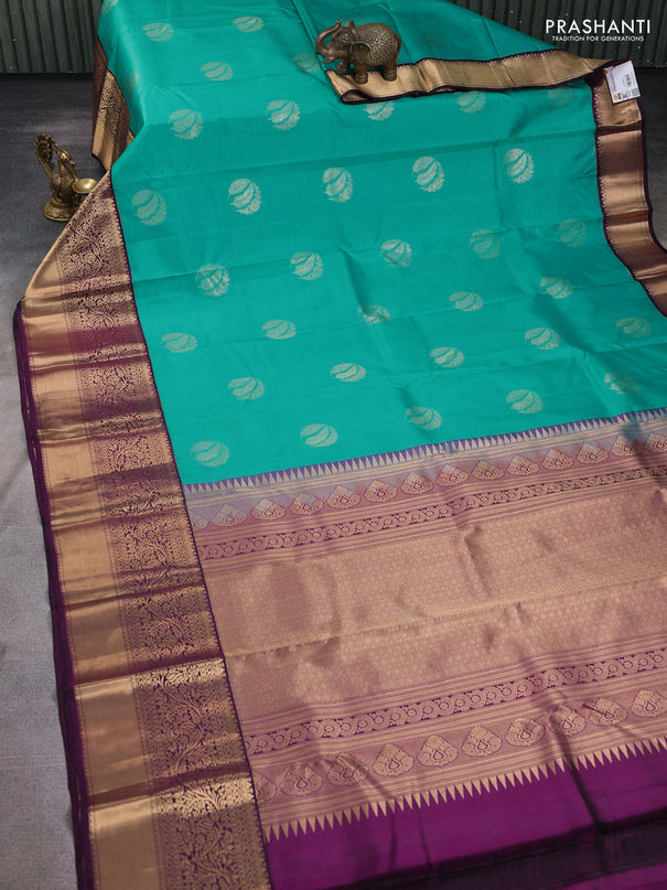 Pure kanchipuram silk saree teal green and wine shade with zari woven buttas and long zari woven korvai border