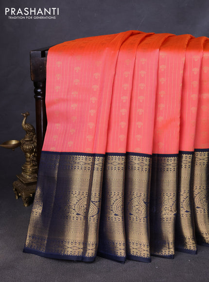 Pure kanchipuram silk saree peach shade and navy blue with allover zari stripes & buttas and long zari woven korvai border