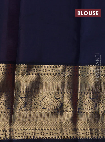 Pure kanchipuram silk saree peach shade and navy blue with allover zari stripes & buttas and long zari woven korvai border