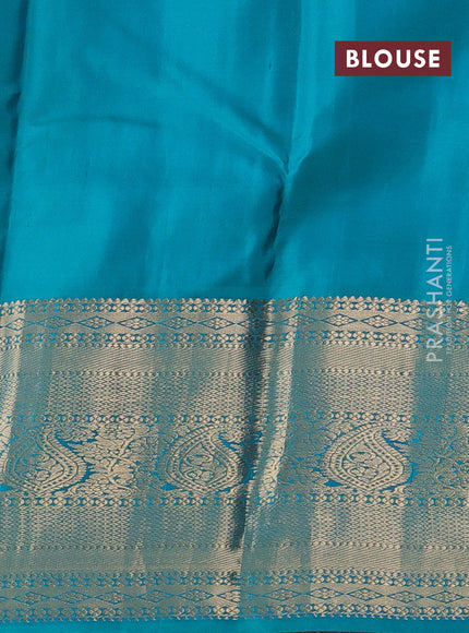 Pure kanchipuram silk saree yellow and teal green with allover zari stripes & buttas and long zari woven korvai border