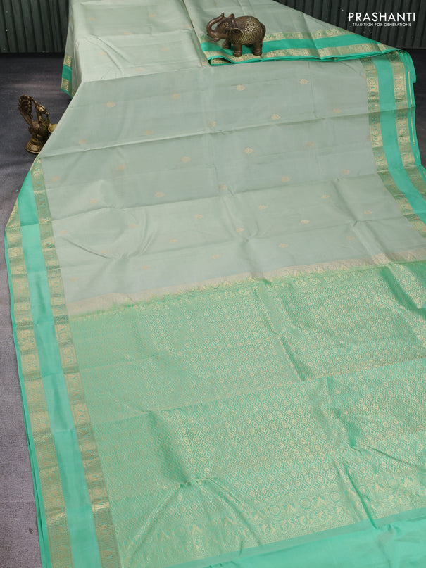 Pure kanchipuram silk saree pastel green and teal green with zari woven buttas and rettapet zari woven border