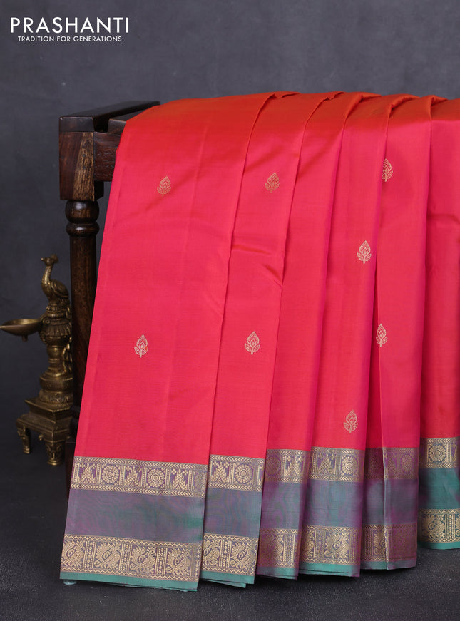 Pure kanchipuram silk saree dual shade of reddish pink and teal green with zari woven buttas and rettapet zari woven border