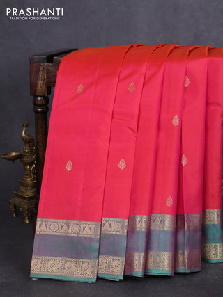 Pure kanchipuram silk saree dual shade of reddish pink and teal green with zari woven buttas and rettapet zari woven border