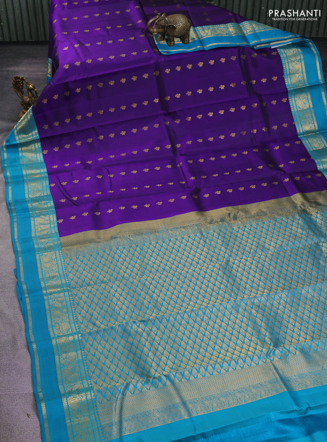 Pure kanchipuram silk saree violet and teal blue with zari woven buttas and rettapet zari woven border