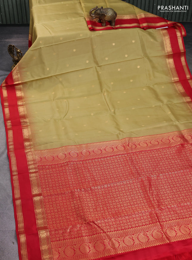 Pure kanchipuram silk saree sandal and red with zari woven buttas and rettapet zari woven border