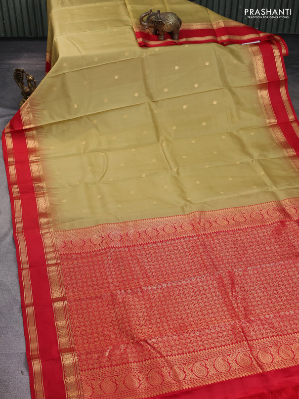 Pure kanchipuram silk saree sandal and red with zari woven buttas and rettapet zari woven border