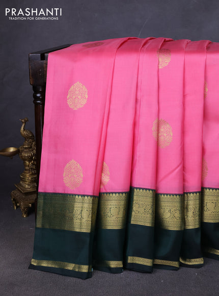 Pure kanchipuram silk saree peach pink and bottle green with zari woven buttas and rettapet zari woven korvai border