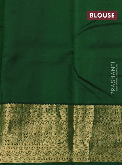 Pure kanchipuram silk saree dual shade of pinkish yellow and green with allover zari woven buttas and zari woven border