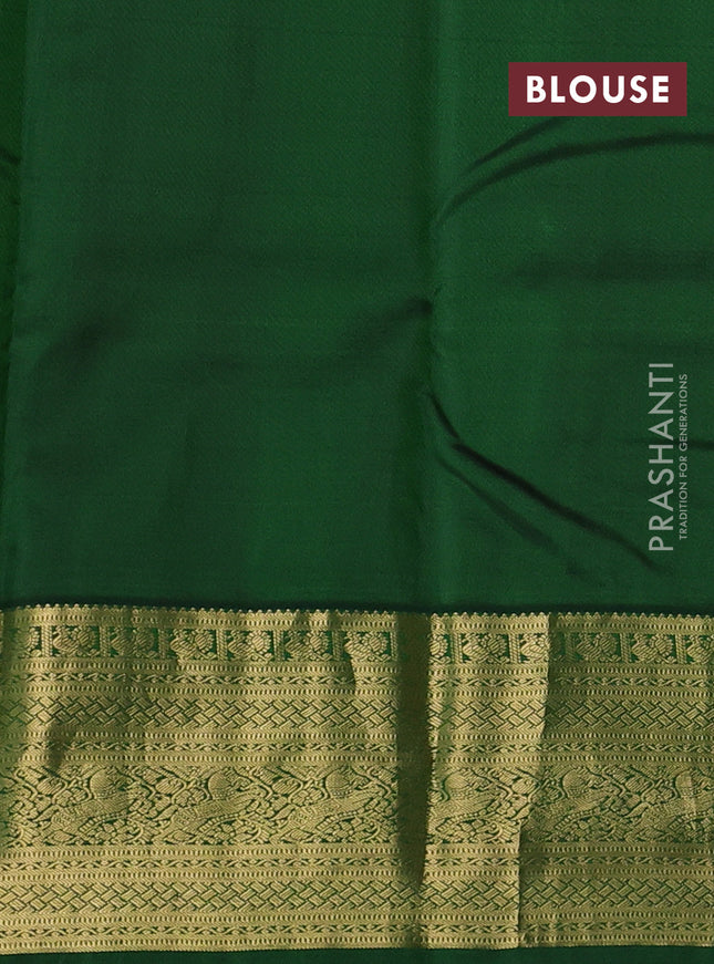 Pure kanchipuram silk saree dual shade of pinkish yellow and green with allover zari woven buttas and zari woven border