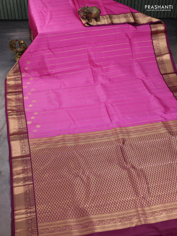 Pure kanchipuram silk saree pink and wine shade with allover zari weaves and zari woven korvai border