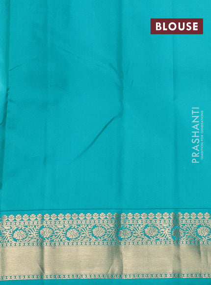 Pure kanchipuram silk saree yellow and teal green with allover zari stripes pattern and zari woven korvai border