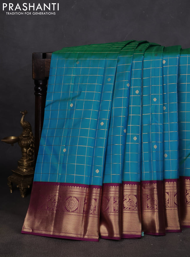 Pure kanchipuram silk saree dual shade of green and purple with allover zari checks & buttas and zari woven korvai border