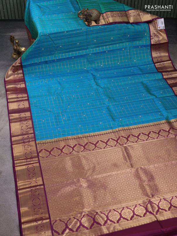 Pure kanchipuram silk saree dual shade of green and purple with allover zari checks & buttas and zari woven korvai border