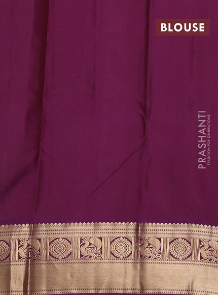Pure kanchipuram silk saree dual shade of green and purple with allover zari checks & buttas and zari woven korvai border
