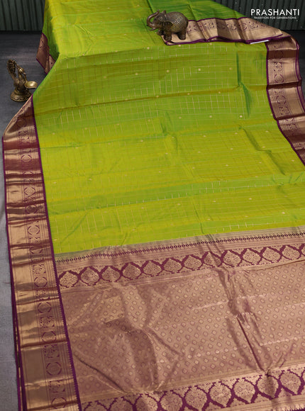 Pure kanchipuram silk saree light green and purple with allover zari checks & buttas and zari woven korvai border