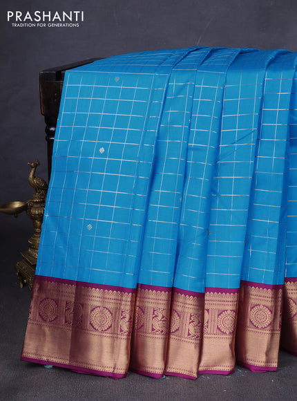 Pure kanchipuram silk saree cs blue and purple with allover zari checks & buttas and zari woven korvai border