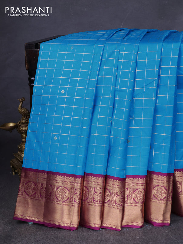 Pure kanchipuram silk saree cs blue and purple with allover zari checks & buttas and zari woven korvai border