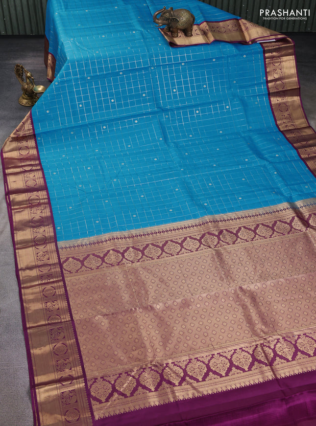 Pure kanchipuram silk saree cs blue and purple with allover zari checks & buttas and zari woven korvai border