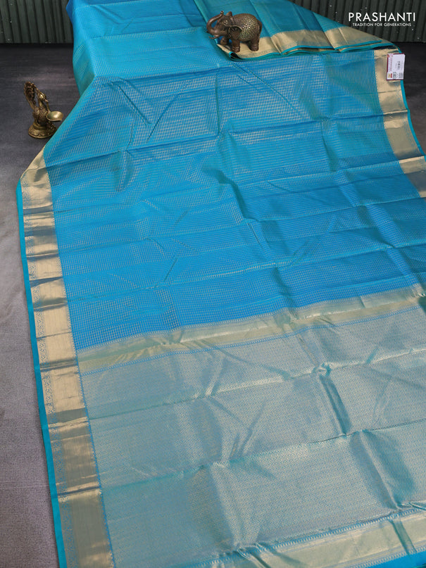 Pure kanchipuram silk saree teal blue with allover zari small zari checked pattern and zari woven border