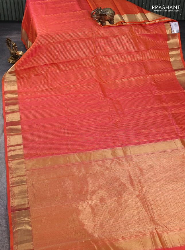 Pure kanchipuram silk saree orange with allover zari small zari checked pattern and zari woven border