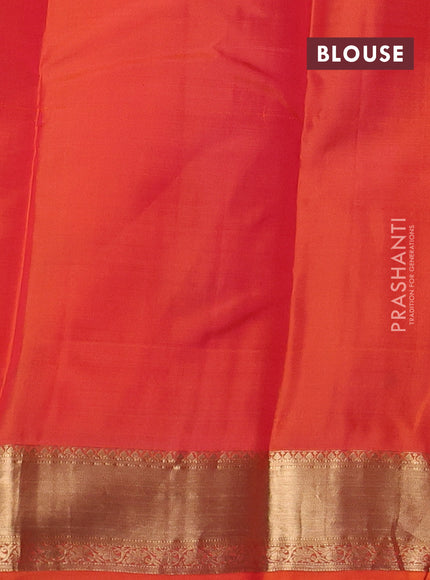 Pure kanchipuram silk saree orange with allover zari small zari checked pattern and zari woven border