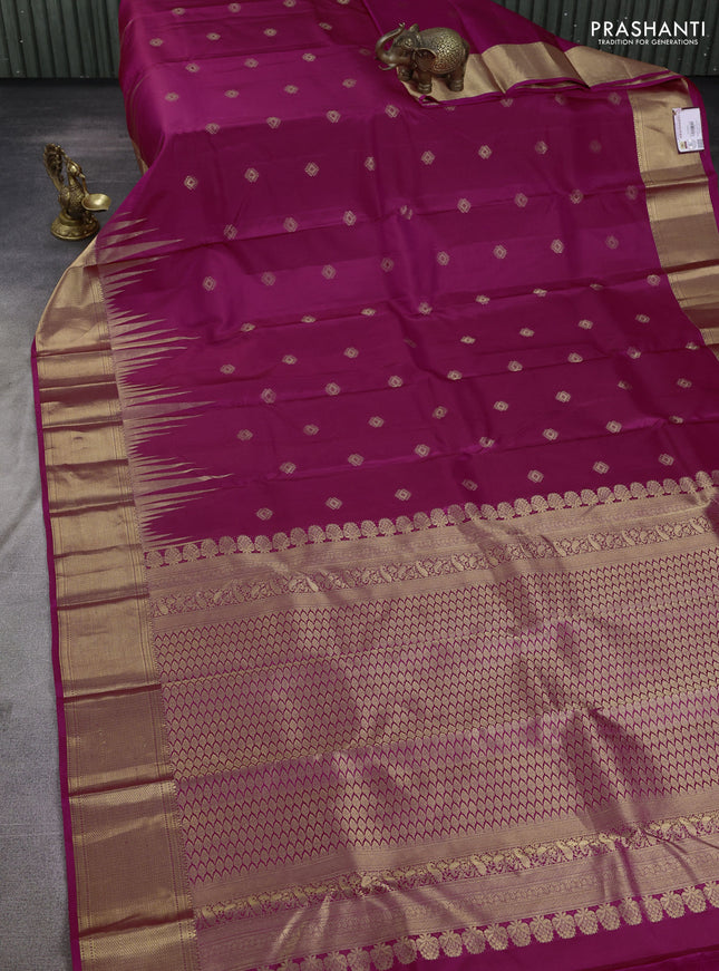 Pure kanchipuram silk saree wine shade with zari woven buttas and zari woven border