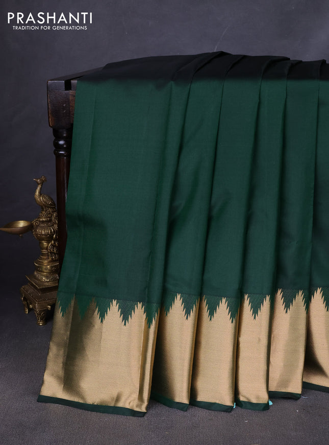 Pure kanchipuram silk saree bottle green with plain body and temple zari woven border